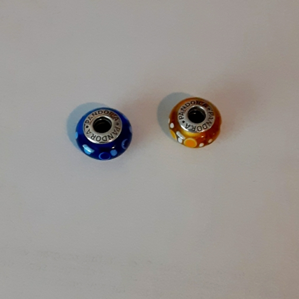 Two Pandora Muranos.